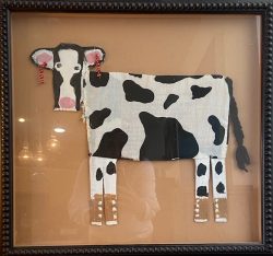 Cow with Earrings by Mamie Dexhillie